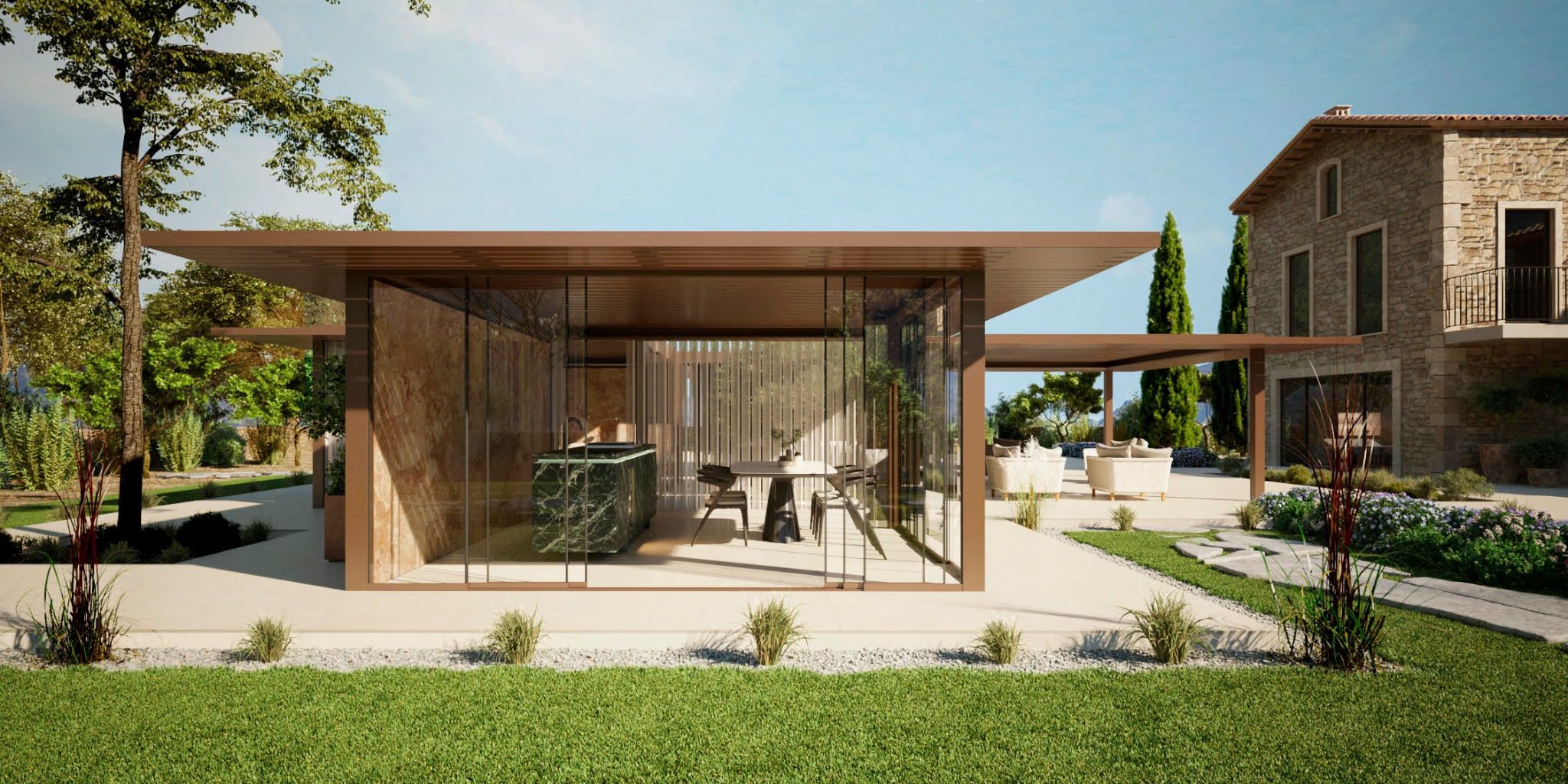 Glazed kitchen and dining pavilion integrated beside a stone house